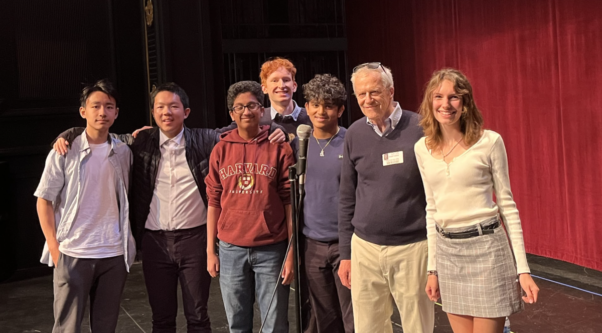 The Geography club members stand alongside Mr. Sullivan to thank him for his visit.